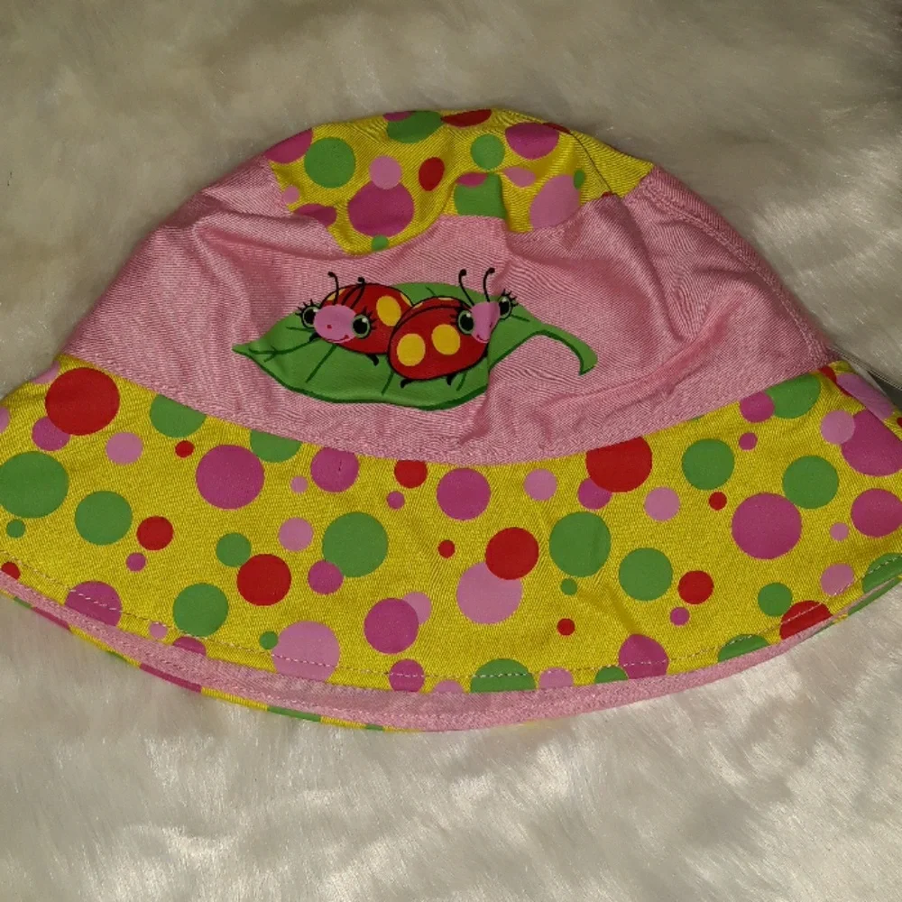 Melissa and Doug and Geoffrey the Giraffe kids hats